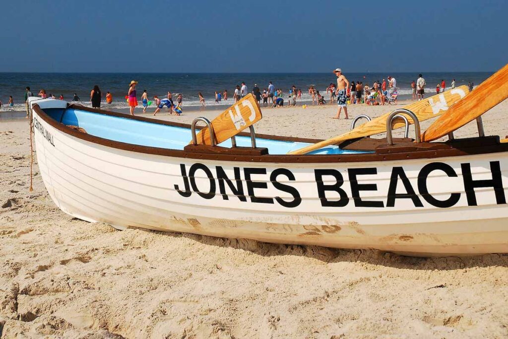 Life Boat on the sand that reads Jones Beach