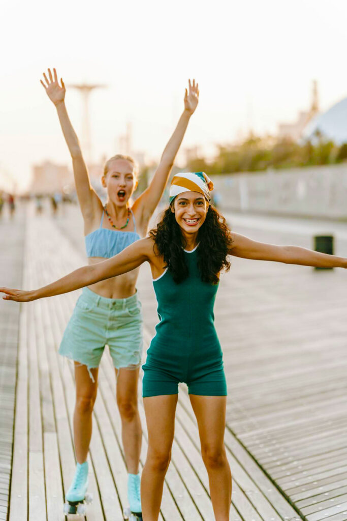 Two young woman blissful on vacation on Long Island.